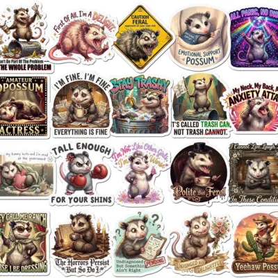Twenty opossum stickers in ornate vintage frames, captioned Be The Whole Problem, Emotional Support Possum and The Horrors Persist But So Do I