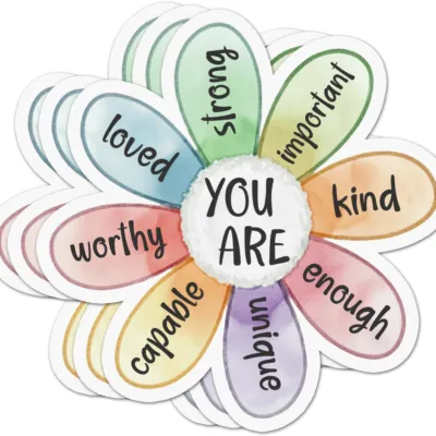 Daisy-shaped sticker with coloured petals reading strong, important, kind, enough, unique, capable, worthy and loved around a centre reading You Are